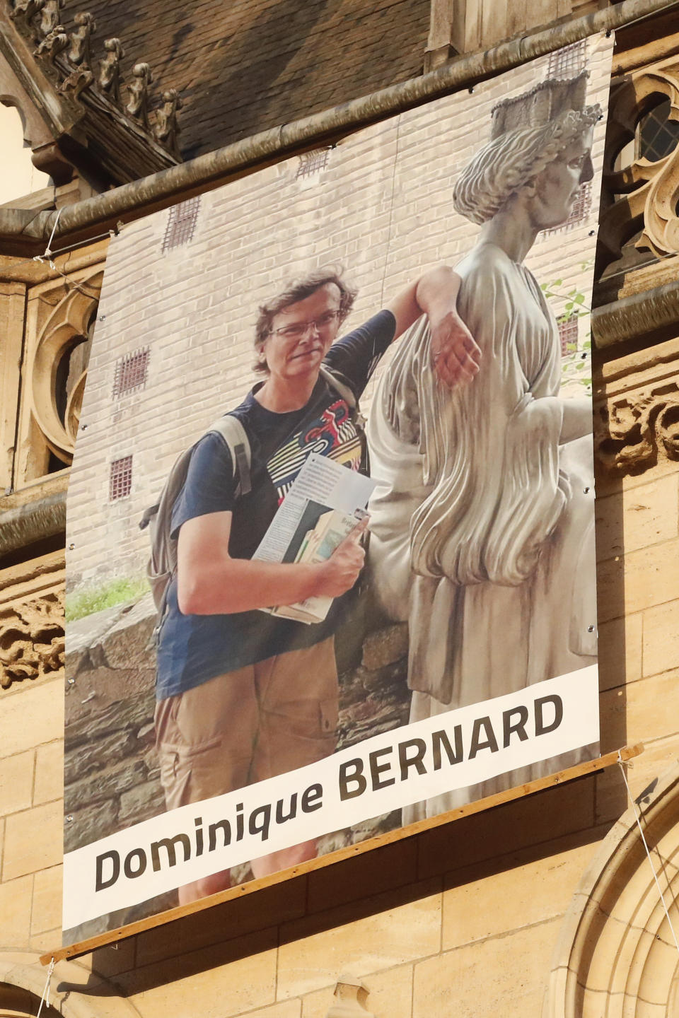 A portrait of late French teacher Dominique Bernard, 57, who was stabbed to death at the school by a suspected Islamist extremist, is on display, in Arras, northern France, Thursday, Oct. 19, 2023. (AP Photo/Michel Spingler)