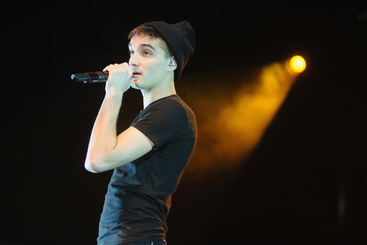 Tom Parker of The Wanted, seen performing in 2013, has died at age 33. (Photo: Timothy Hiatt/Getty Images for Radio.com)