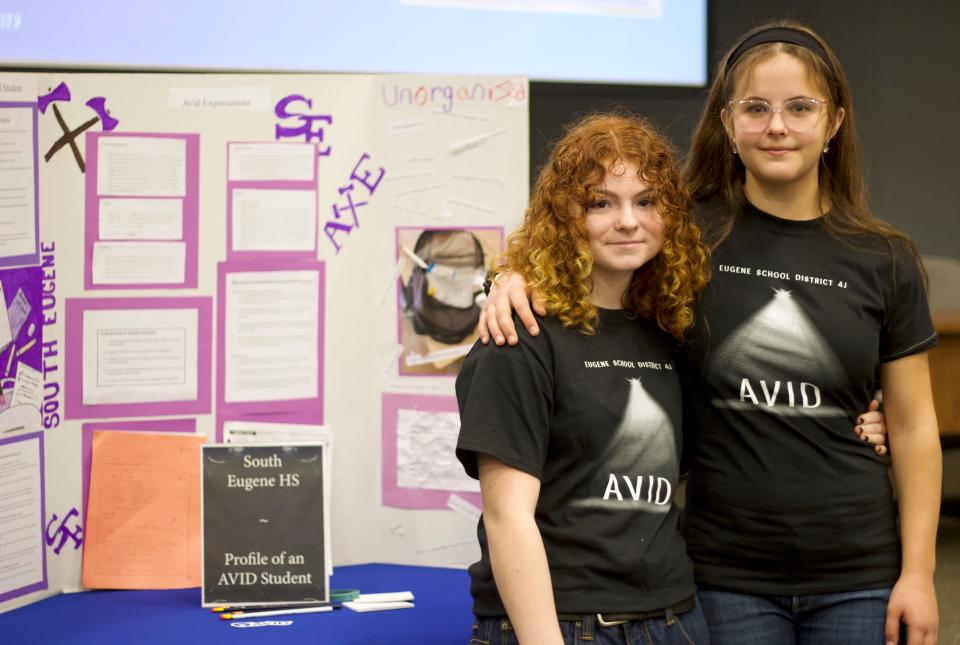 Josie Campbell, left, and Piper Everts, sophomores at South Eugene High, helped create a poster on what it means to be an AVID students for an AVID Spotlight event for Eugene School District 4J on Thursday, March 8, 2024.