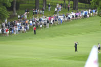 Phil Mickelson hits a shot from the 15th fairway during the second round of the Wells Fargo Championship golf tournament at Quail Hollow Club in Charlotte, N.C., Friday, May 7, 2021. (Jeff Siner/The Charlotte Observer via AP)