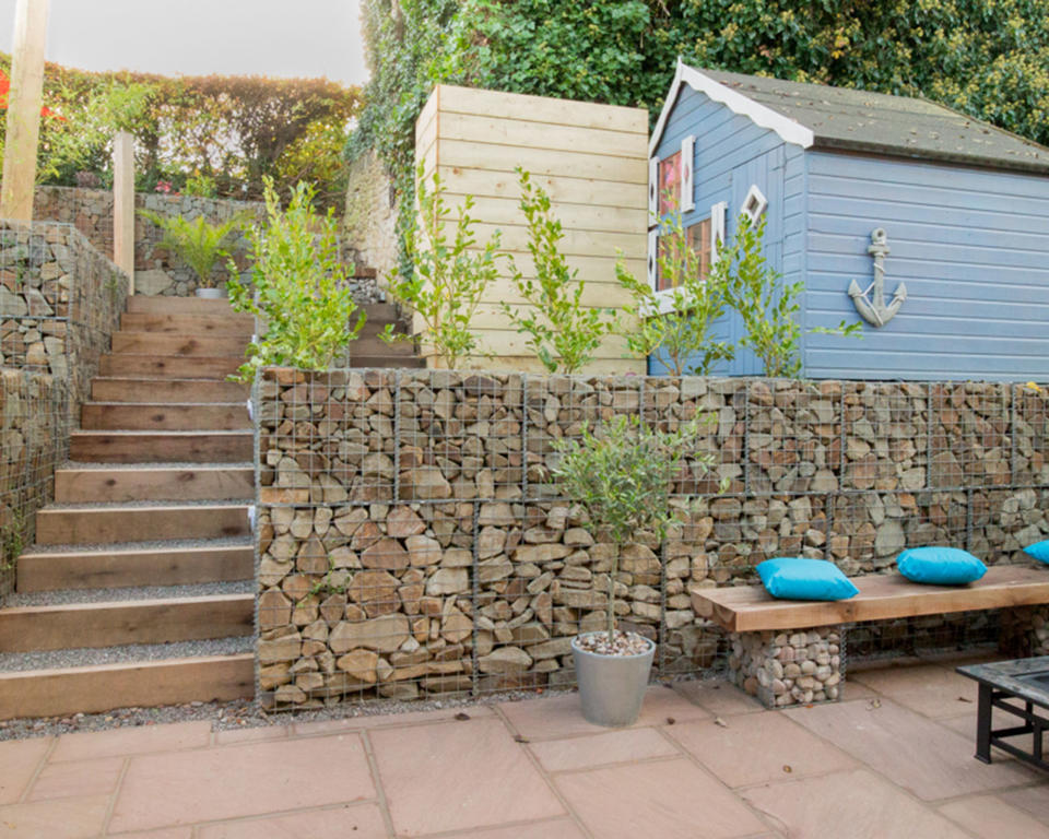 12. Terrace a tiered plot with stone-filled gabions