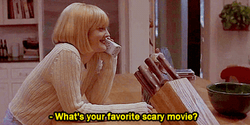 A woman on the phone is asked "What's your favorite scary movie?"