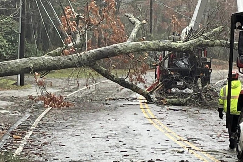 A downed tree blocks a local road in Hanover, Mass., about 25 miles south Boston, in the wake of a powerful storm that pounded New England on Monday. Photo courtesy Hanover Police Department/Facebook