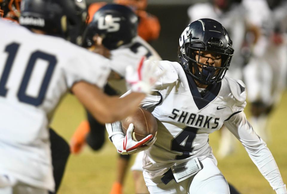 Zay Flowers of University runs the ball during the 2018 Class 4A state semifinal against Cocoa.