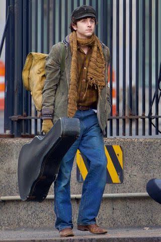 <p>Diggzy/Shutterstock/Splash / SplashNews.com</p> Timothée Chalamet is spotted on set of the upcoming Bob Dylan biopic for the first time in New York City on March 17, 2024