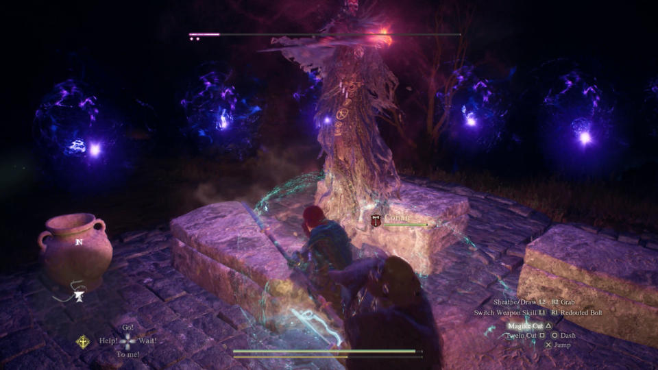 The Mystic Spearhand taking a swipe at a hidden necromancer boss that spawned at night. PHOTO: Screengrab from Capcom