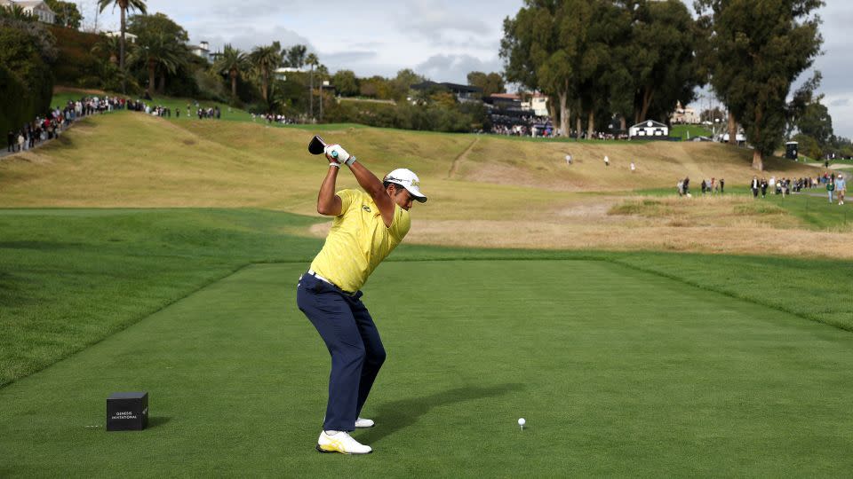 Matsuyama tees off for the final time during the last round. - Harry How/Getty Images