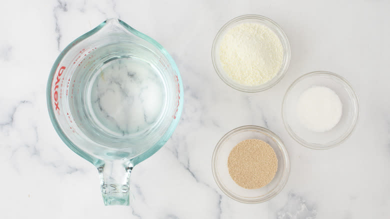 water, sugar, yeast in bowls