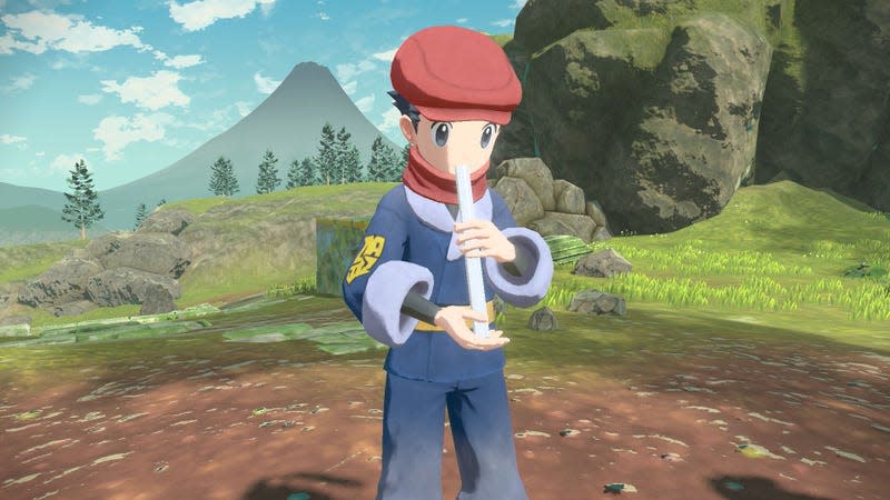 A Pok&#xe9;mon trainer holds a flute in Pok&#xe9;mon Legends Arceus, one of the video games coming out in January 2022.