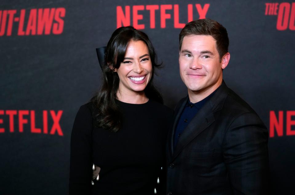 Adam Devine and Chloe Bridges at a screening of the film "The Out-Laws" on June 26, 2023, at in Los Angeles.