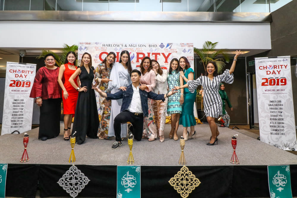 Local celebrities volunteered in a charity event organised by Harlow’s &amp; MGI to raise funds for 10 charitable organisations. — Picture by Hari Anggara