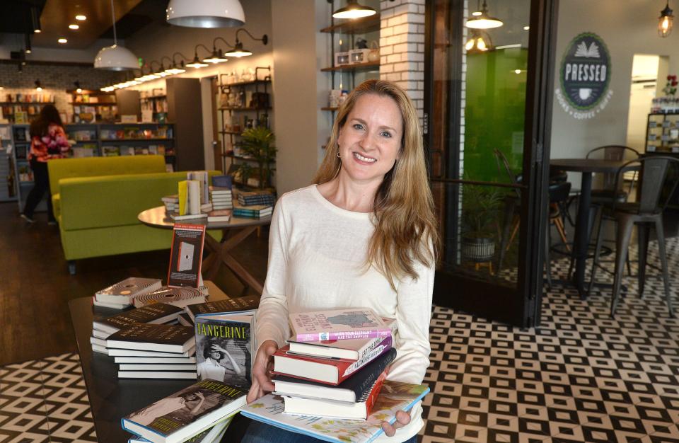 Tracey Bowes, the owner of Pressed, a 4,000-square-foot book store, cafe and gift shop at 1535 W. 8th St., Erie, is photographed in her store in April 2018.