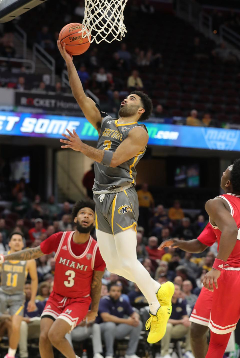 Kent State's Sincere Carry drives in for a basket against Miami in a Mid-American Conference Tournament quarterfinal game on Thursday March 10, 2022 in Cleveland, Ohio, at Rocket Mortgage FieldHouse.