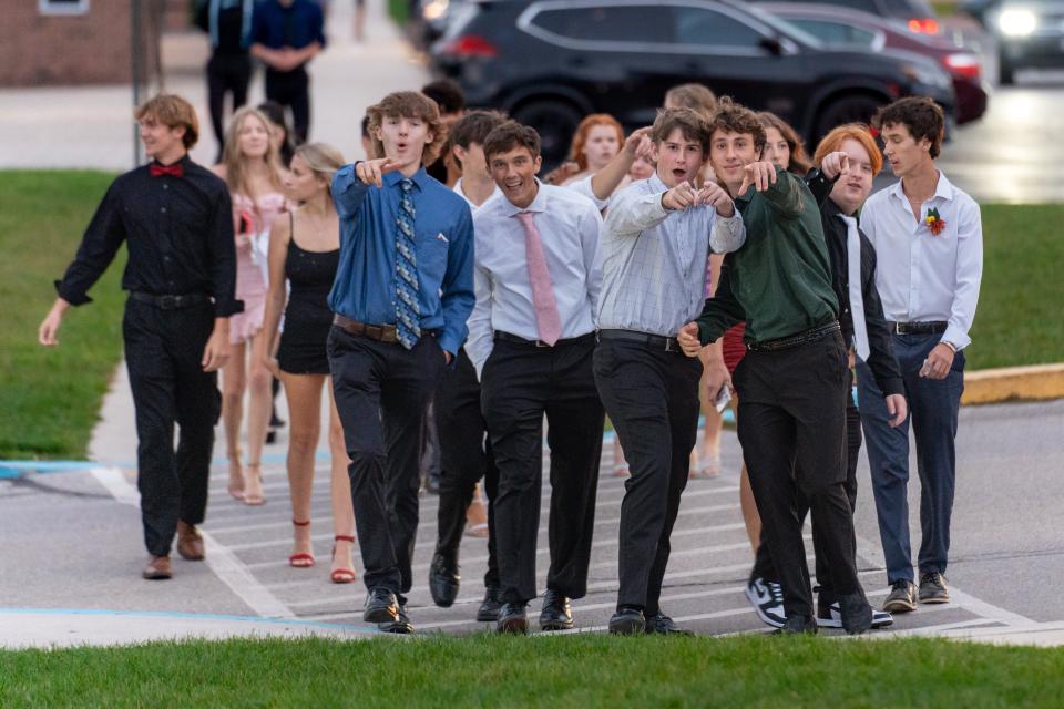 Students arrive at South Western High School's homecoming dance on Saturday, Sept. 30, 2023.