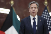 U.S. Secretary of State Antony Blinken participates in a news conference with Kuwaiti Foreign Minister Sheikh Ahmad Nasser Al-Mohammad Al-Sabah at the Ministry of Foreign Affairs in Kuwait City, Kuwait, Thursday, July 29, 2021. (Jonathan Ernst/Pool via AP)