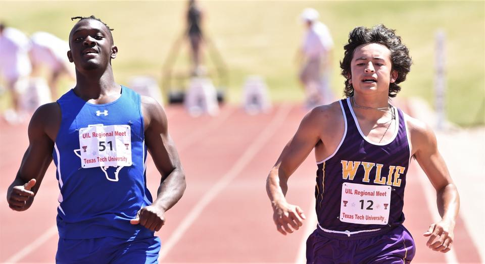 Wylie's Braden Regala, right, races to the finish line in the 100 meters at the Region I-5A track and field meet Saturday at Lowrey Field. Regala finished seventh in 11.04 seconds.
