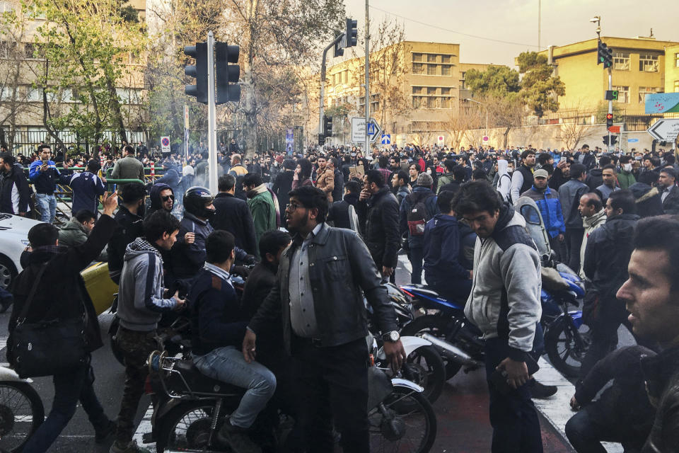 <p>In this photo taken by an individual not employed by the Associated Press and obtained by the AP outside Iran, demonstrators gather to protest against Iran’s weak economy, in Tehran, Iran, Saturday, Dec. 30, 2017. (Photo: AP) </p>