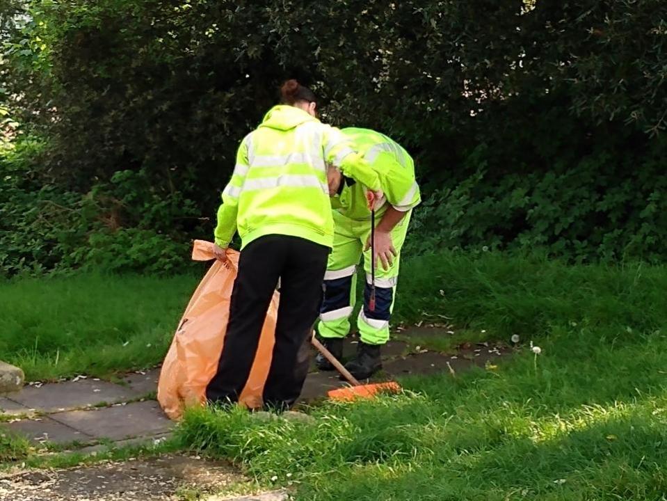 South Wales Argus: Monmouthshire County Council staff clearing waste from the car park where Travellers had stayed.