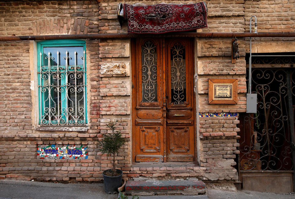 <p>A front door of an old house is seen in the old town, Tbilisi, Georgia, April 6, 2017. (Photo: David Mdzinarishvili/Reuters) </p>