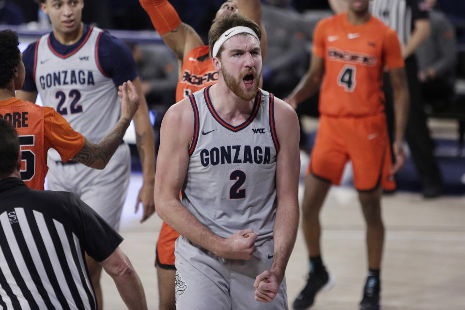 Gonzaga forward Drew Timme celebrates after scoring a basket during the first half of the team's NCAA college basketball game against Pacific in Spokane, Wash., Saturday, Jan. 23, 2021. (AP Photo/Young Kwak)