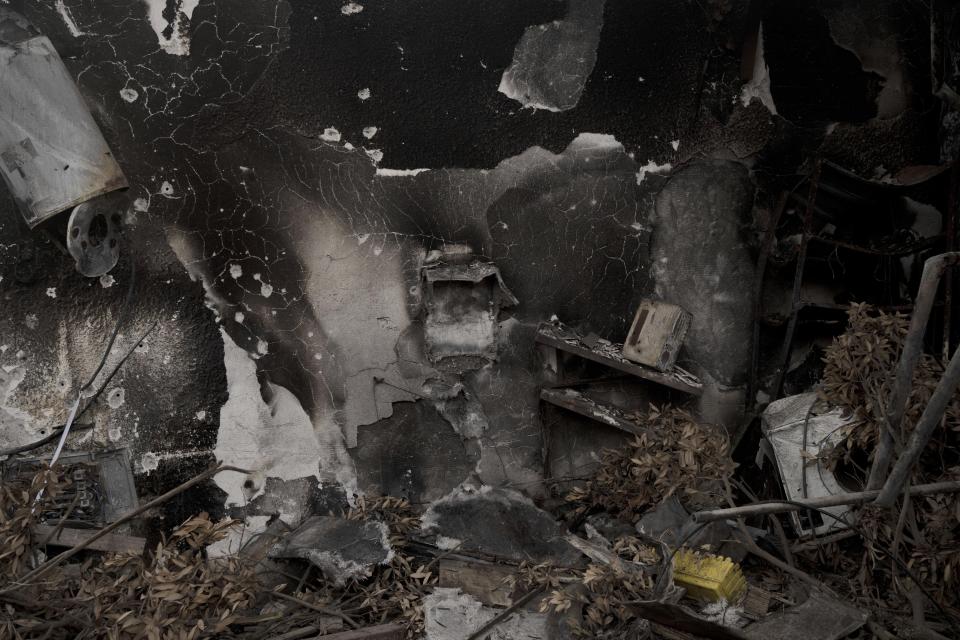 A home destroyed at Kibbutz Kfar Azza, near the Israel-Gaza Border, the site of an Oct. 7 massacre by Hamas, seen during a visit by former New Jersey Governor Chris Christie, Sunday, Nov. 12, 2023. (AP Photo/Maya Alleruzzo)