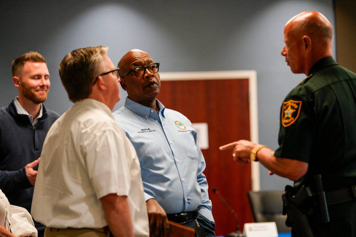 St. Petersburg Mayor Ken Welch speaks with Pinellas Sheriff Bob Gualtieri before the start of a press conference regarding Hurricane Ian at the Pinellas County Emergency Operations Center, Monday, Sept. 26, 2022, in Largo, Fla.