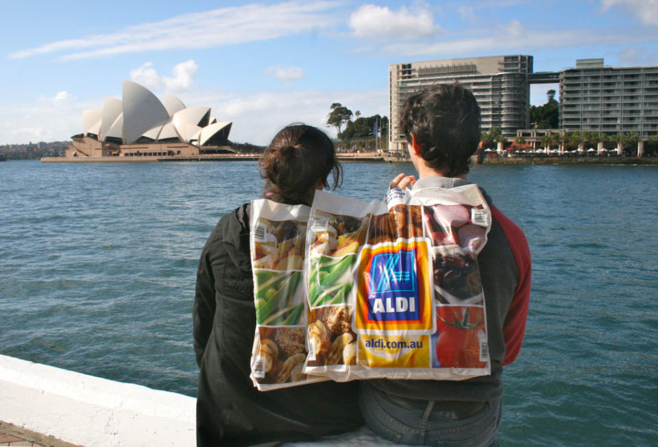 Aldi customers at the Opera House in Sydney, Australia, 19 July 2015. (Photo by Frank Walker/picture alliance via Getty Images)