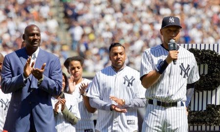 Sep 7, 2014; New York, NY, USA; New York Yankees shortstop Derek Jeter addresses the crowd as he is honored at a ceremony before the game against the Kansas City Royals at Yankee Stadium. William Perlman/THE STAR-LEDGER via USA TODAY Sports