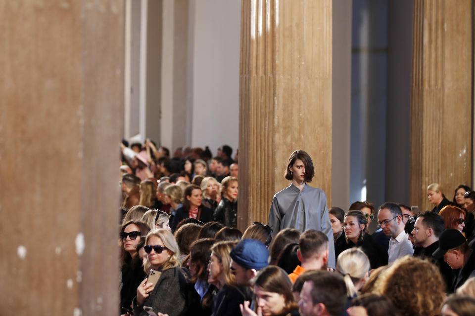 A model wears a creation as part of the Salvatore Ferragamo women's Fall Winter 2020-21 collection, unveiled during the Fashion Week in Milan, Italy, Saturday, Feb. 22, 2020. (AP Photo/Antonio Calanni)