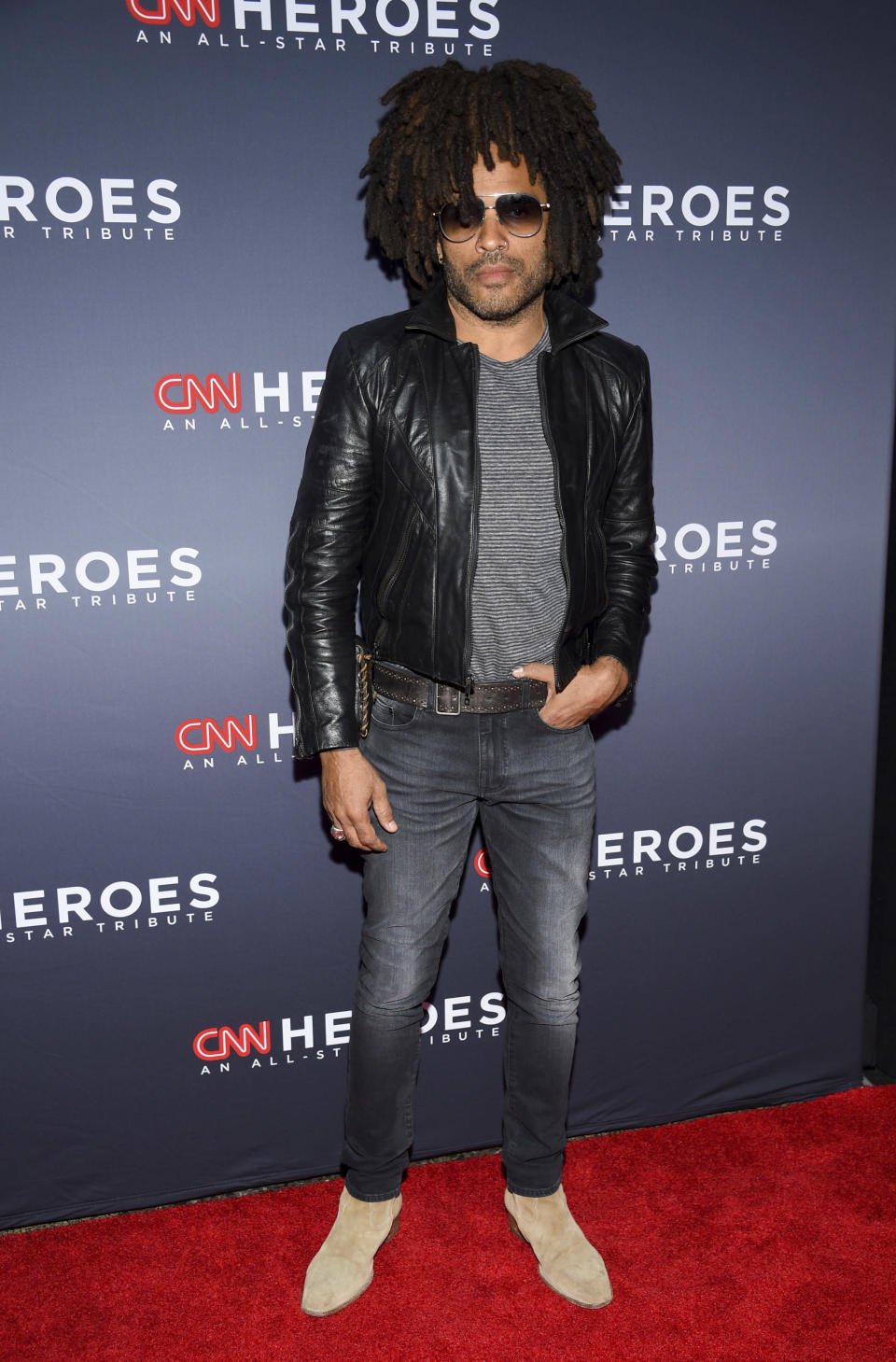 FILE - Musician Lenny Kravitz attends the 12th annual CNN Heroes: An All-Star Tribute in New York on Dec. 9, 2018. In a new memoir, "Let Love Rule," Kravitz explores his childhood and ends with him on the verge of stardom and deeply in love with actress Lisa Bonet. (Photo by Evan Agostini/Invision/AP, File)