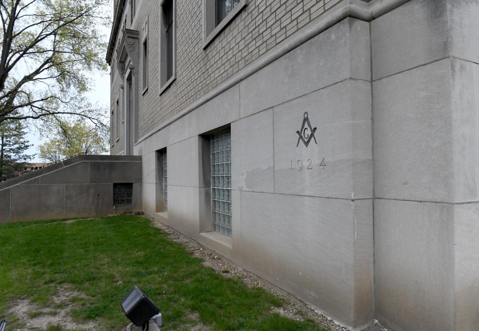 The Canton Masonic Temple cornerstone didn't contain a time capsule after all, so organizers made a new one at the temple's rededication ceremony Saturday.