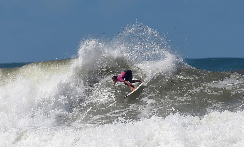 FILE PHOTO: French surfer Justine Dupont rides her wave at Casablanca Beach during the Quiksilver and Roxy Pro Casablanca surfing competition in Casablanca