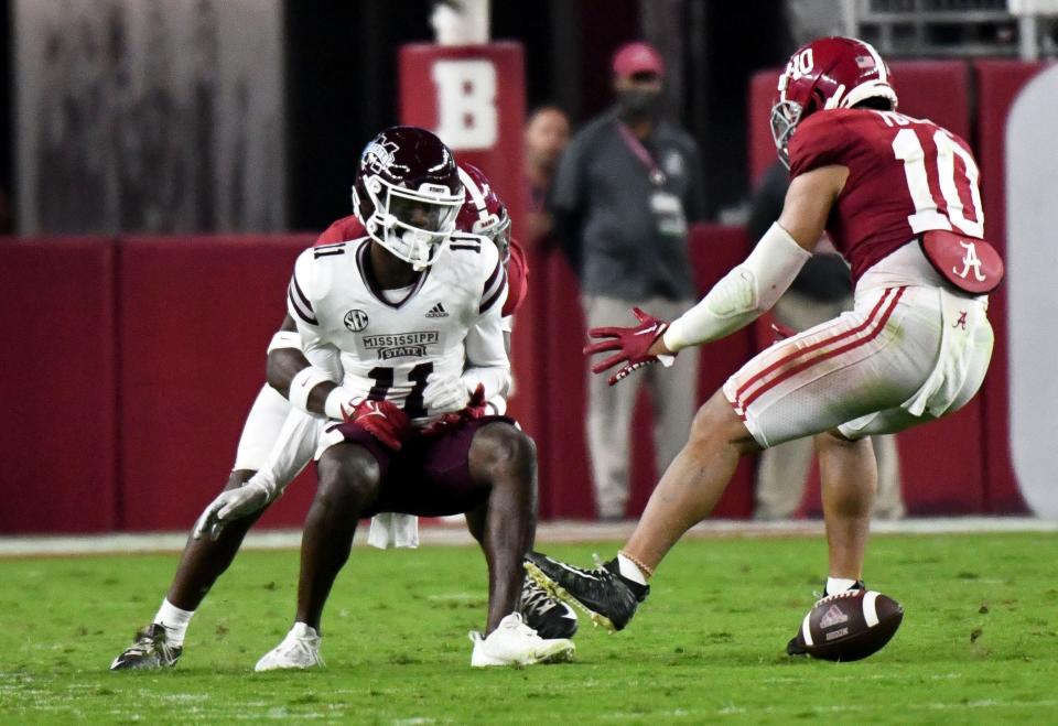 Oct 22, 2022; Tuscaloosa, Alabama, USA;  Alabama defensive back Eli Ricks (7) breaks up a fourth down pass attempt intended for Mississippi State wide receiver Jaden Walley (11) with Alabama linebacker Henry To'o To'o (10) closing on the play at Bryant-Denny Stadium. Mandatory Credit: Gary Cosby Jr.-USA TODAY Sports