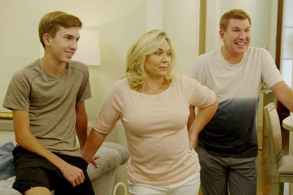 USA Network/NBCU Photo Bank via Getty Grayson Chrisley with parents Todd and Julie