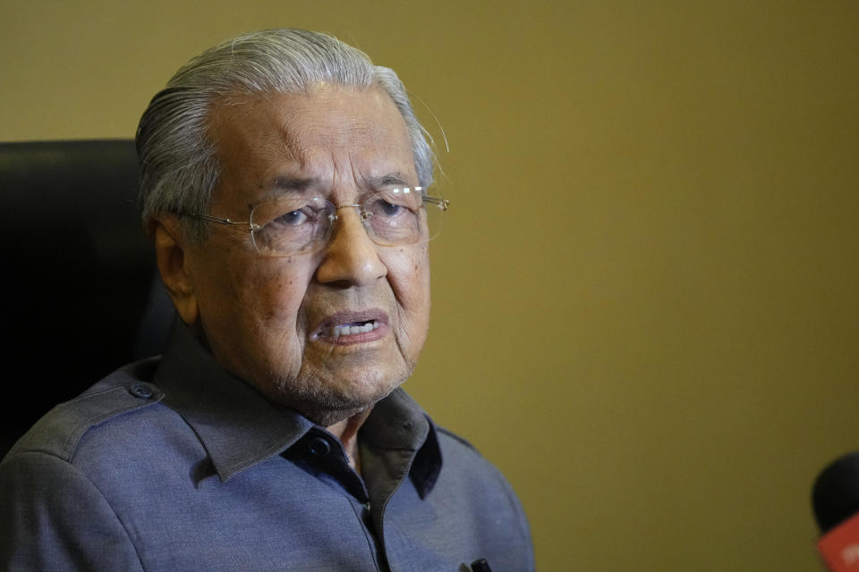 Former Malaysian Prime Minister Mahathir Mohamad speaks during a news conference at his office in Putrajaya, Malaysia, Monday, Jan. 22, 2024. Mahathir Mohamad said a graft probe into his son's wealth was politically motivated to undermine the opposition. (AP Photo/Vincent Thian)