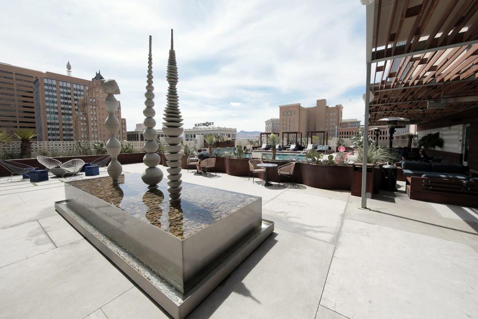 The fifth-floor patio at the Hotel Indigo offers panoramic views of downtown El Paso. A full bar and restaurant open up to the patio. 