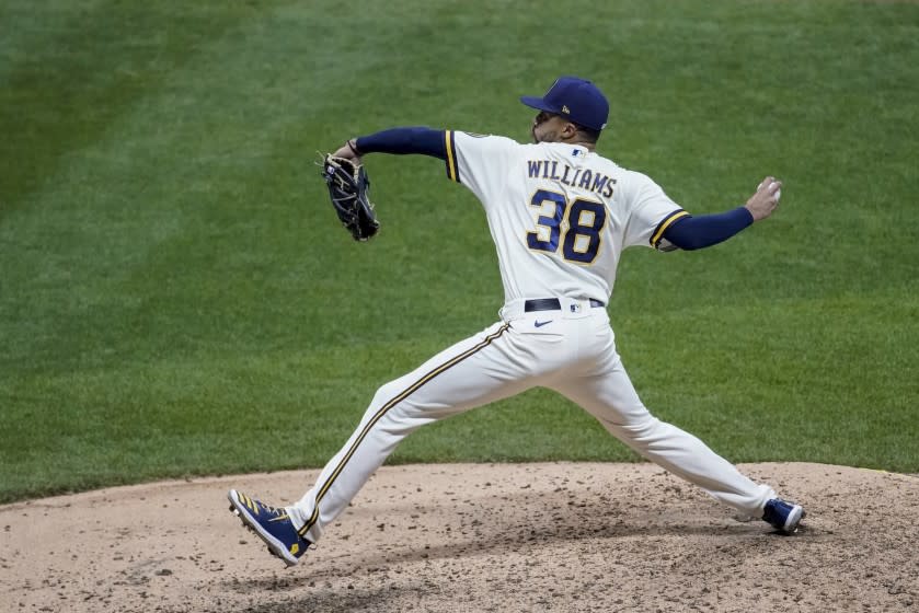 Milwaukee Brewers relief pitcher Devin Williams throws during the seventh inning of a baseball game against the Chicago White Sox Tuesday, Aug. 4, 2020, in Milwaukee. (AP Photo/Morry Gash)