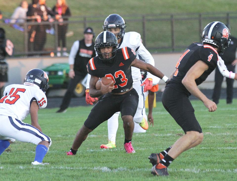 Jacob Thompson set a new Sturgis school record with 317 yards rushing against Wyoming Kelloggsville in a 56-0 Trojan victory.