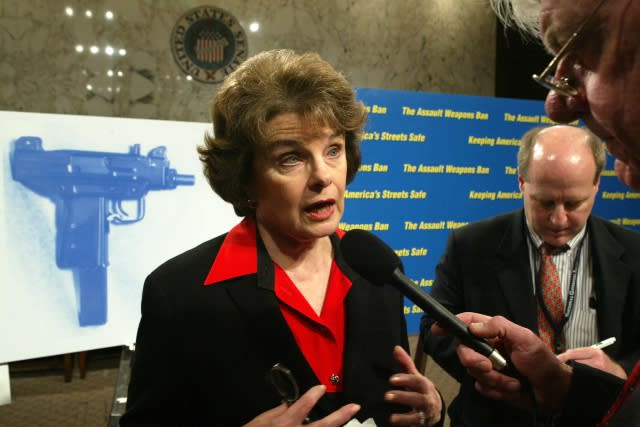 U.S. Senator Dianne Feinstein (D-CA) answers questions from reporters after a rally on assault weapons ban on Capitol Hill March 1, 2004 in Washington, DC. The rally called on the Senate to extend the assault weapons ban by 10 years. 