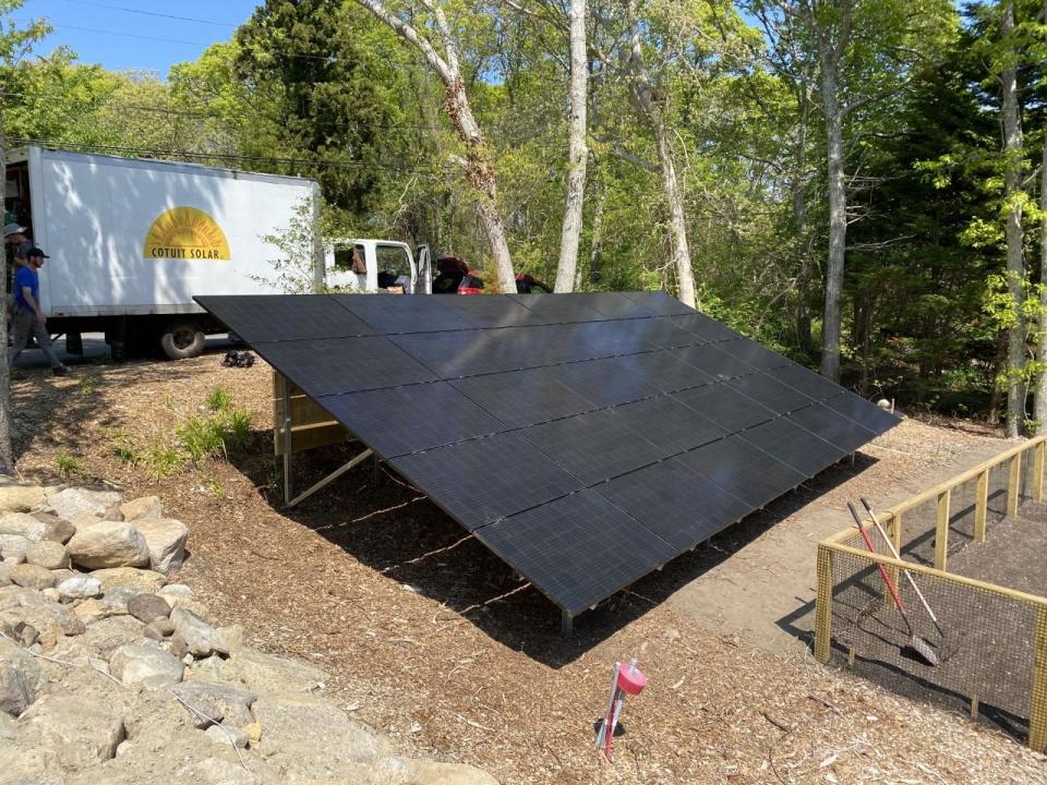 Dan Kilfoyle of Falmouth has a ground-mounted photovoltaic array on his property, in addition to rooftop arrays on his home. The home is among the properties featured in the solar homes tour planned on the Cape on Saturday.
