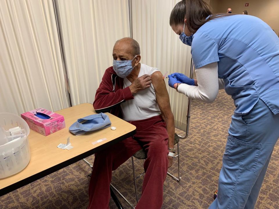 Former Tuskegee Airman Dr. Harold Brown, 96, receives a dose of the COVID-19 vaccine at Magruder Hospital in Port Clinton in January 2021.