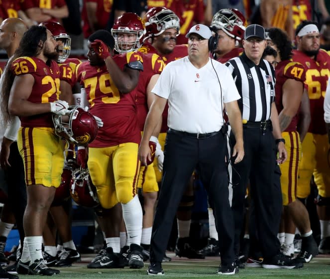 LOS ANGELES, CALIF. - SEP 11, 2021. USC head coach Clay Helton looks at the scoreboard.