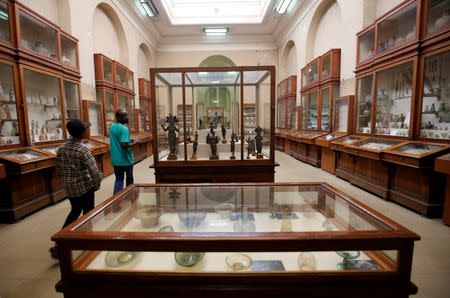 Tourists walk around pharaonic artifacts inside the Egyptian Museum in Cairo, Egypt June 23, 2016. REUTERS/Amr Abdallah Dalsh