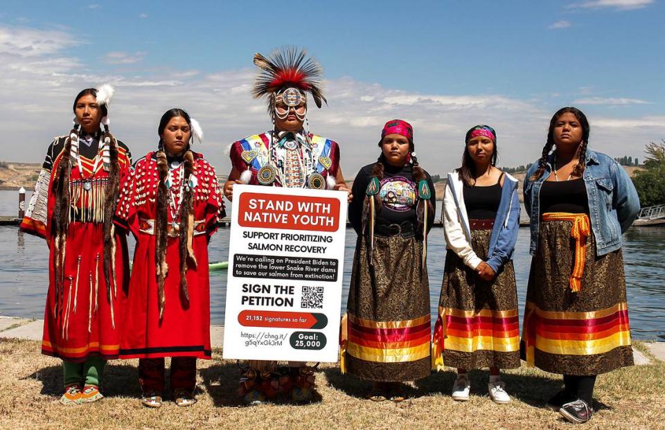 The Yakama Nation and the Confederated Tribes of the Umatilla Indian Reservation called for a comprehensive strategy to save salmon during a gathering on the Snake River Tuesday at Fishhook Park.