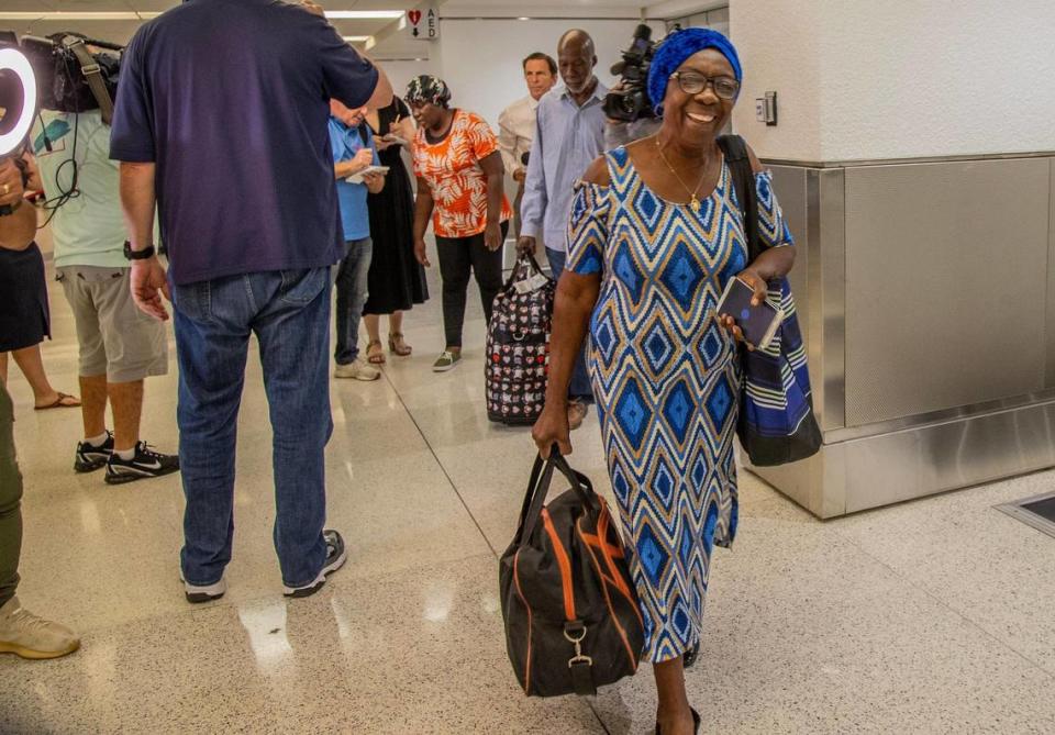 Acephie Etienne walks out of customs at Miami International Airport after arriving in the second State Department evacuation flight from Haiti’s Cap-Haïtien International Airport, on Thursday March 21, 2024. Pedro Portal