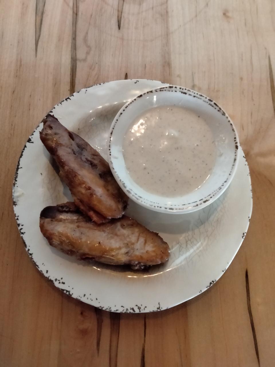 Turkey ribs and signature White Lightnin' sauce at Shack in the Back BBQ restaurant in Louisville.