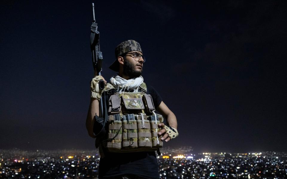 Al Ausy ,18, poses as he guards the area on Wazir hill overlooking Kabul on September 19, 2021 in Kabul, Afghanistan - Paula Bronstein for the Telegraph/Paula Bronstein for the Telegraph