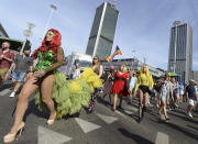 <p>People dressed in drag, take part in the annual gay pride parade in Warsaw, Poland, Saturday, June 9, 2018. The pride celebrations come as LGBT activists say a conservative turn in Poland is only motivating them to fight harder for their rights, even though their hopes of seeing same-sex marriage legalized has no chance now in the country. (Photo: Czarek Sokolowski/AP) </p>