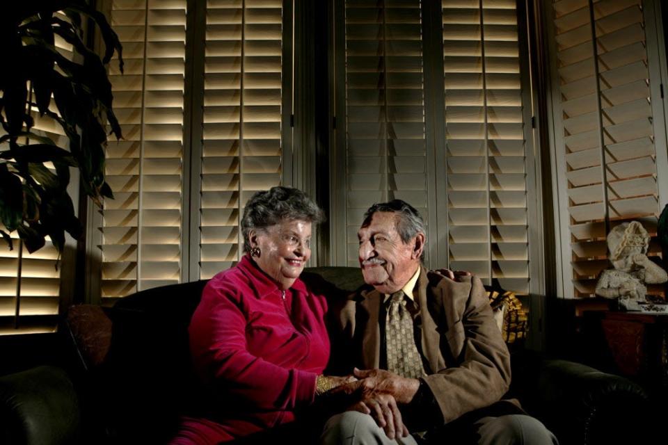This Oct. 16, 2008, file photo shows former Arizona governor and U.S. ambassador Raul Hector Castro and his wife, Patricia Steiner Castro,  in their Nogales, Ariz., home. Castro waited years before introducing his German-Irish wife-to-be to his Mexican-born mother.