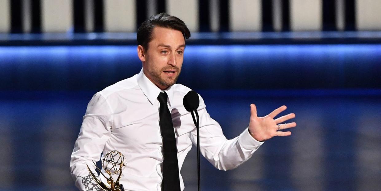 kieran culkin on stage with his emmy award for best actor in a drama series for succession